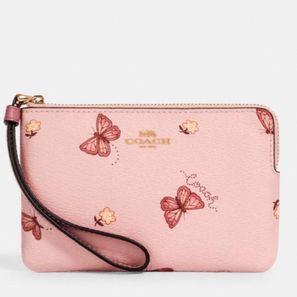 Coach Handbags - COACH Wristlet with Pink Butterfly Print